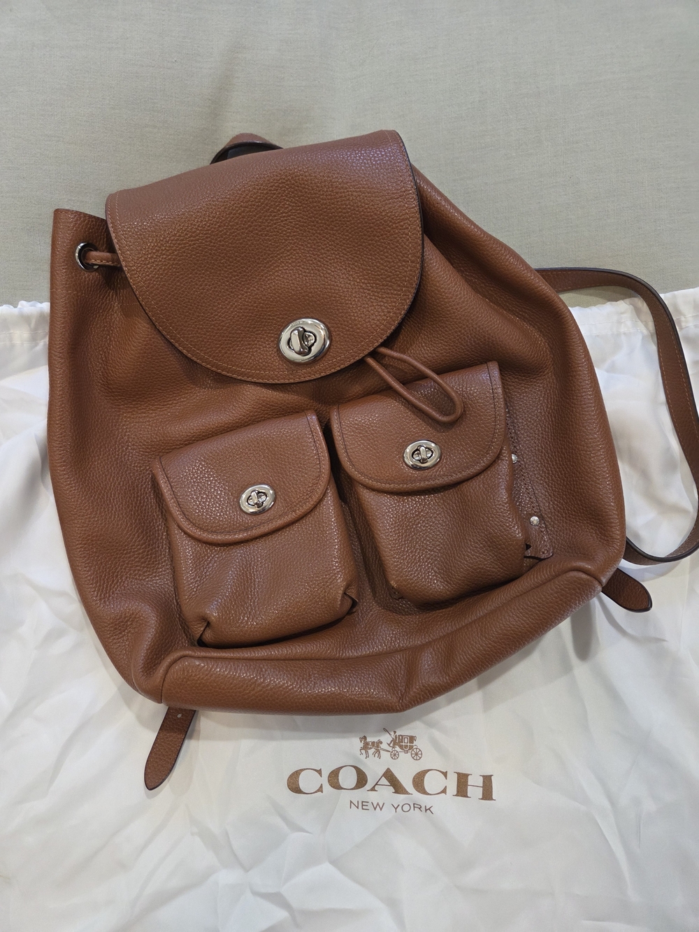 COACH Pebbled Leather Brown Drawstring Backpack